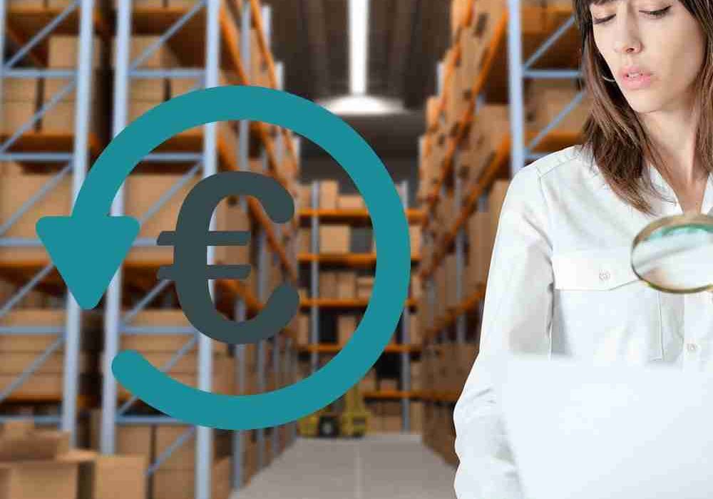 Young woman verifying document with magnifying glass in a distribution warehouse